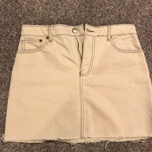 Off white with brown skirt